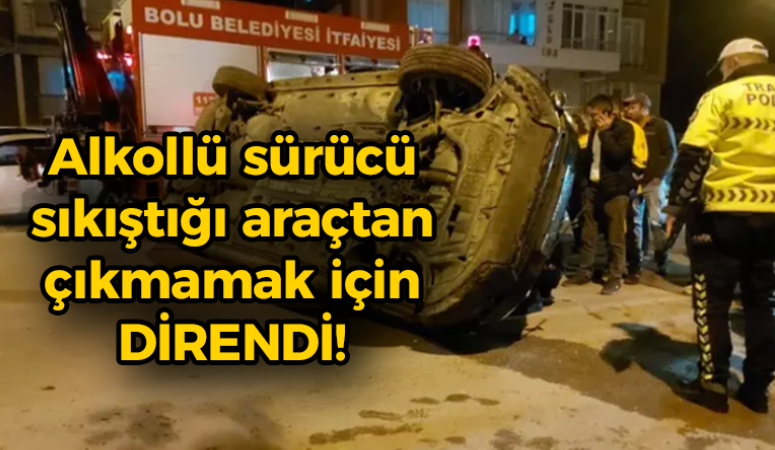 Alkollü sürücü sıkıştığı araçtan çıkmamak için direndi